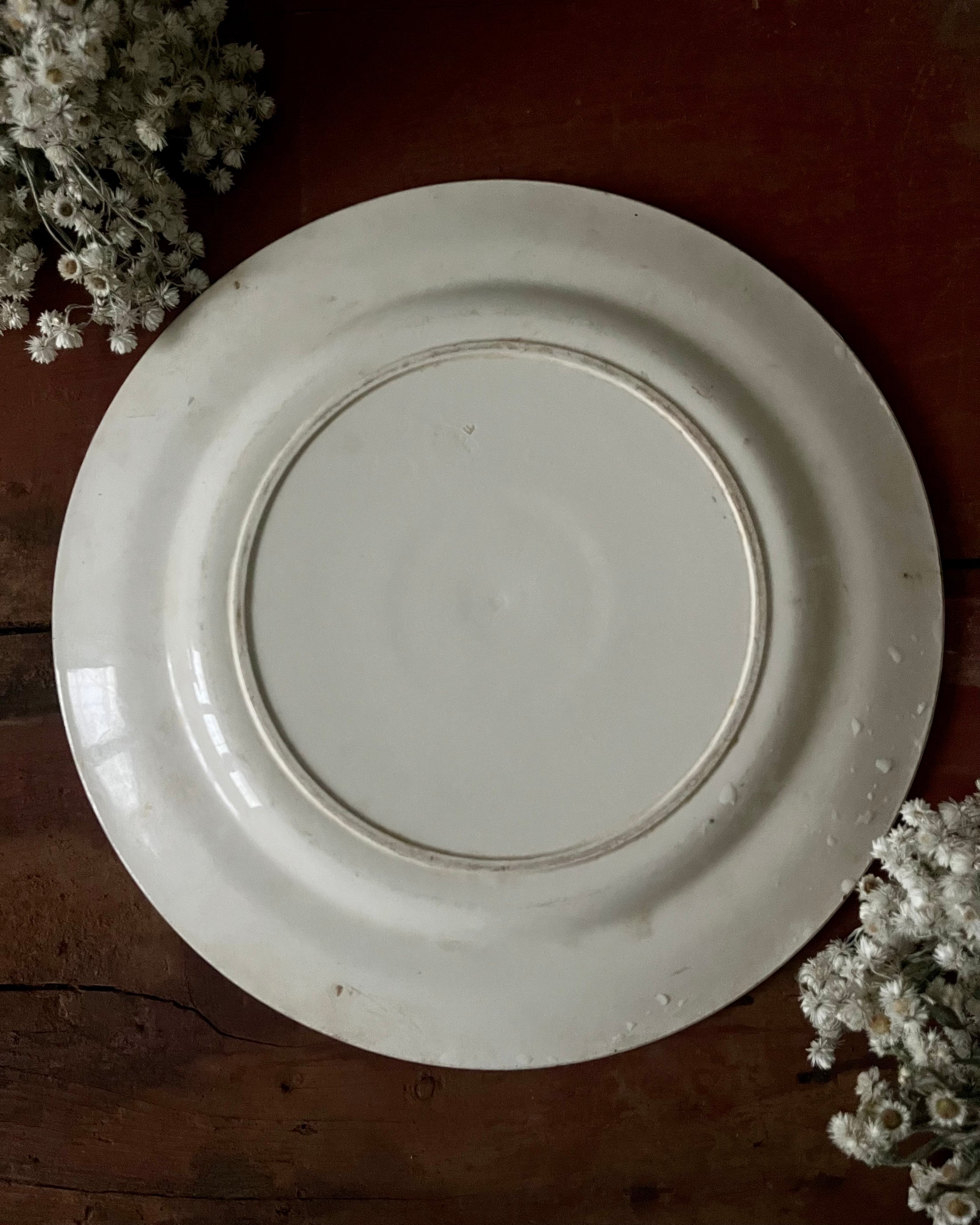 Plat rond plat terre de fer Art Déco
