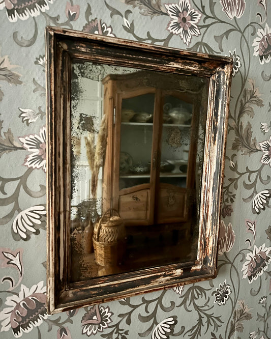 Miroir mural patiné