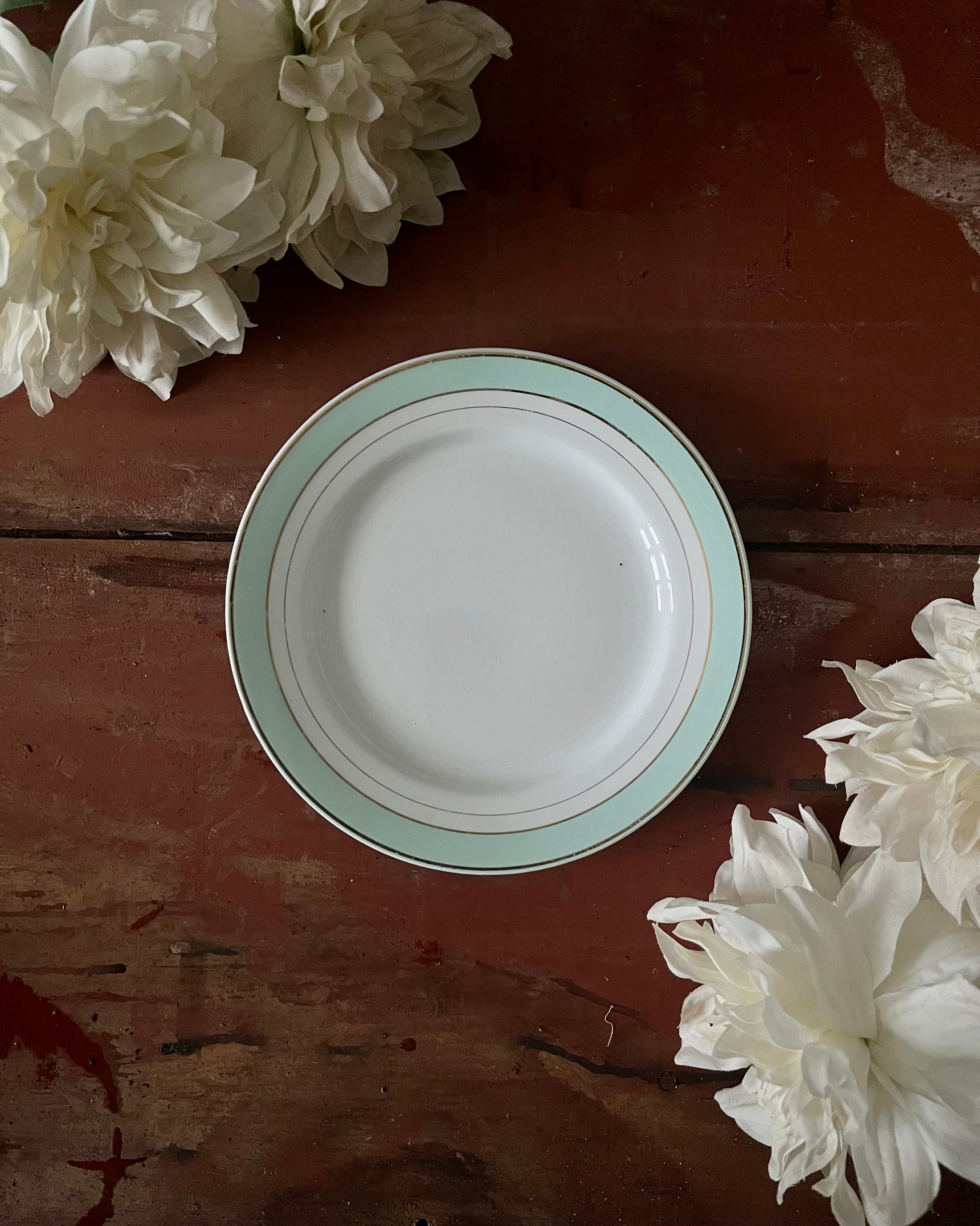 Série de 11 assiettes à dessert Luneville