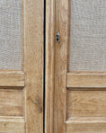 Charger l'image dans la visionneuse de la galerie, Grande armoire parisienne en chêne et toile de jute
