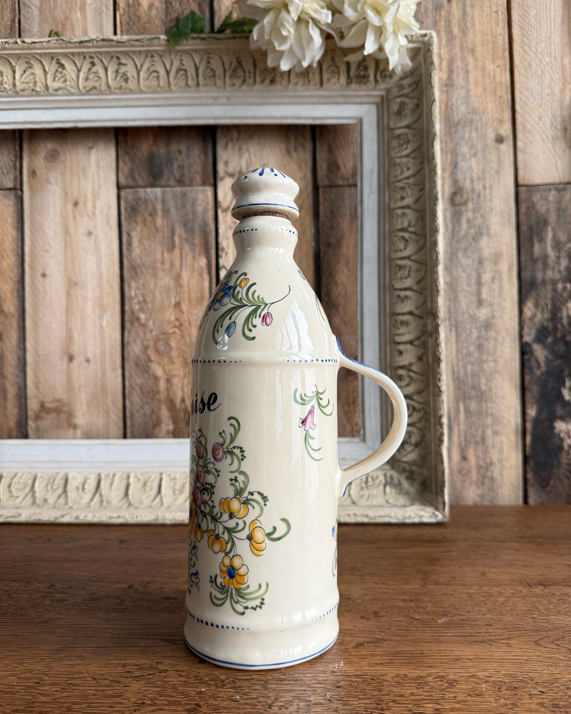 Bouteille en porcelaine d’eau de vie de framboise