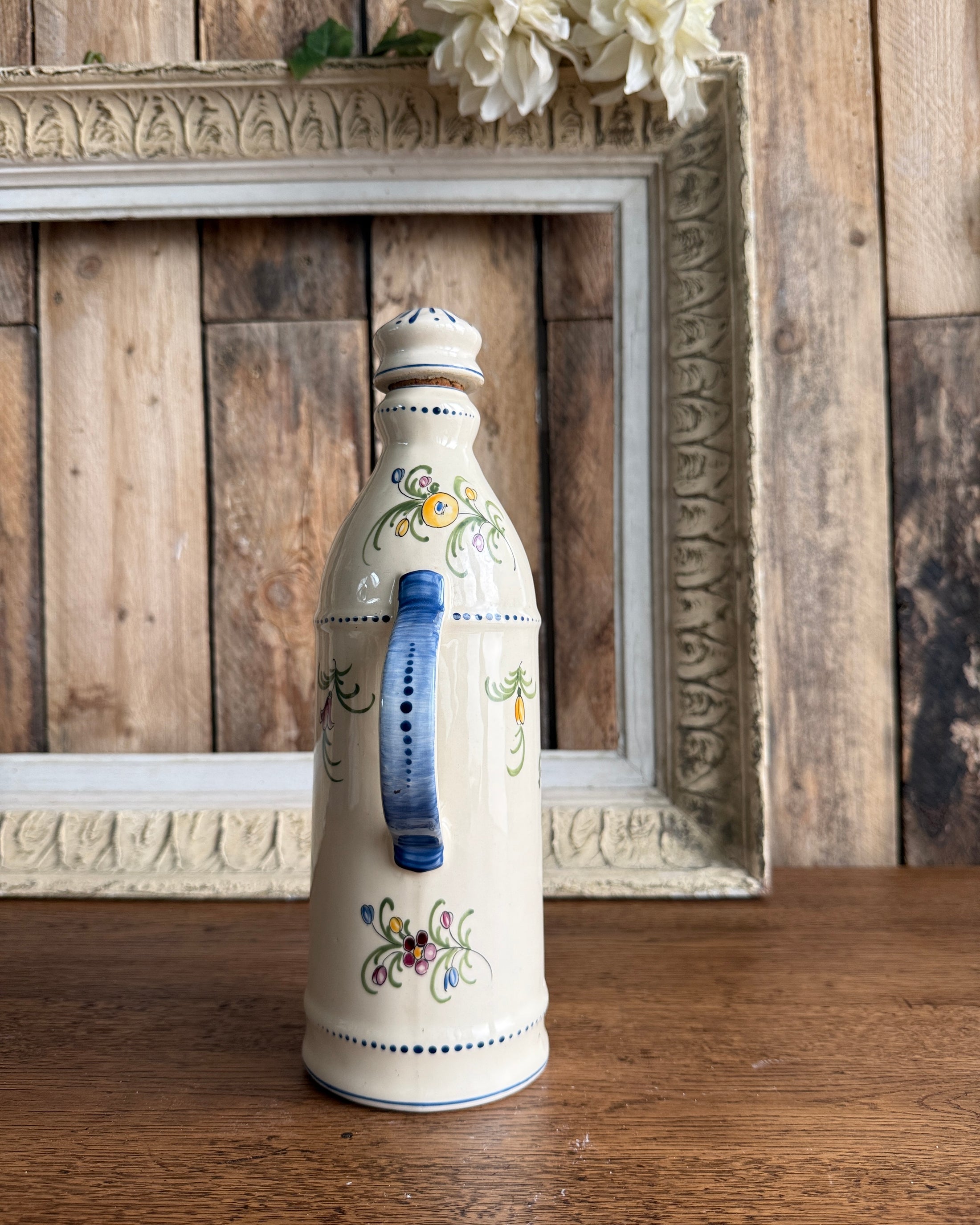 Bouteille en porcelaine d’eau de vie de framboise