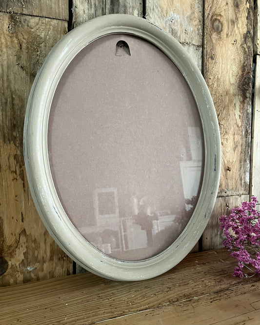 Cadre en bois rose patiné