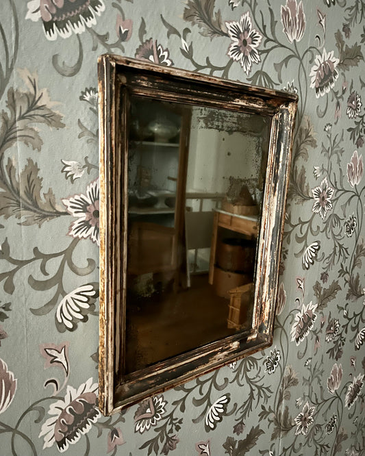 Miroir mural patiné