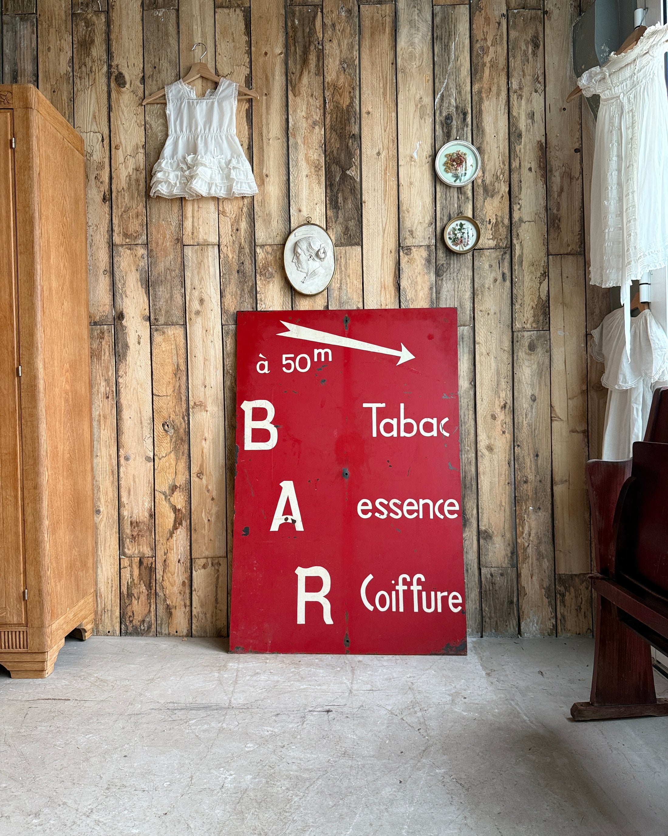 Enseigne vintage en métal