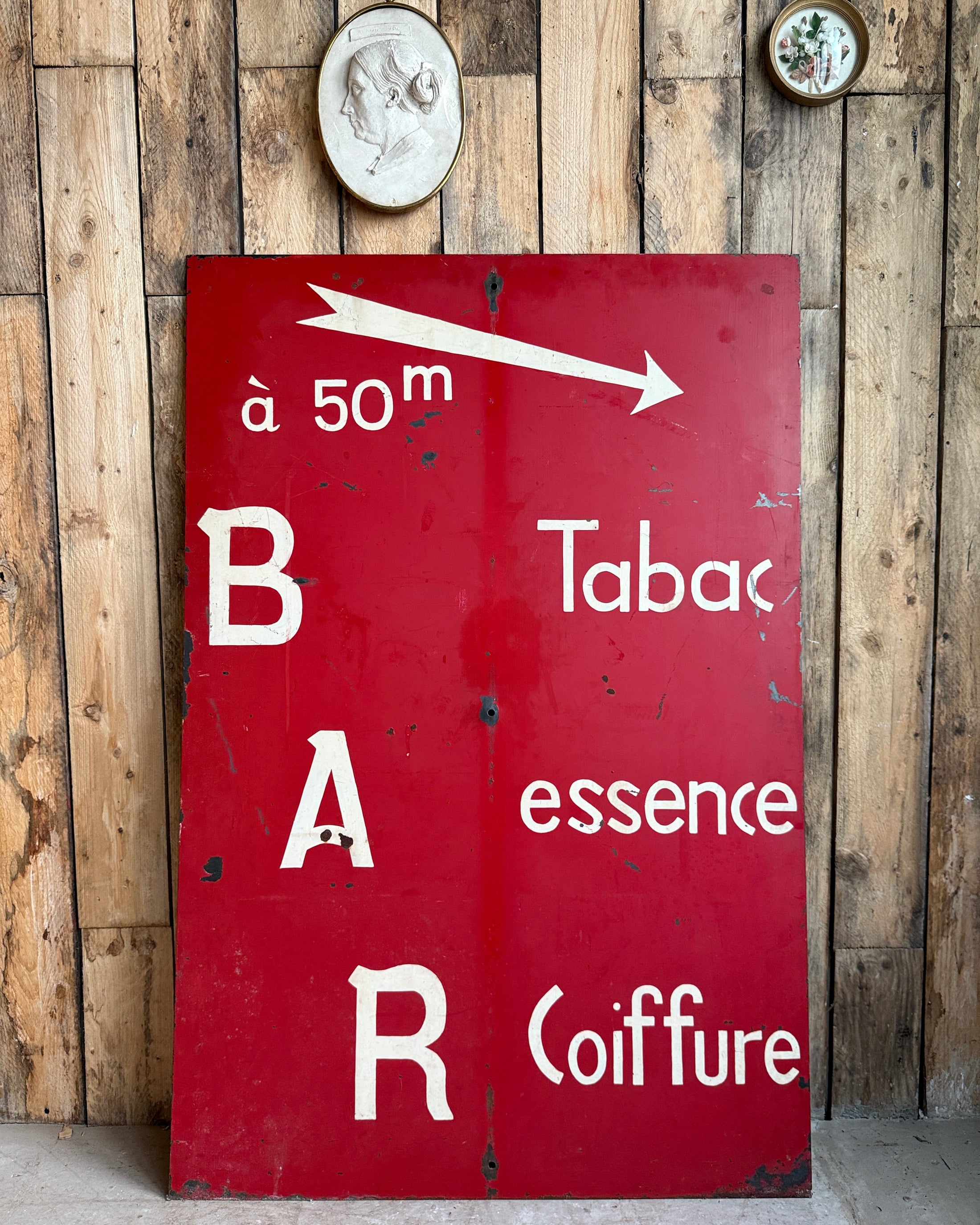 Enseigne vintage en métal