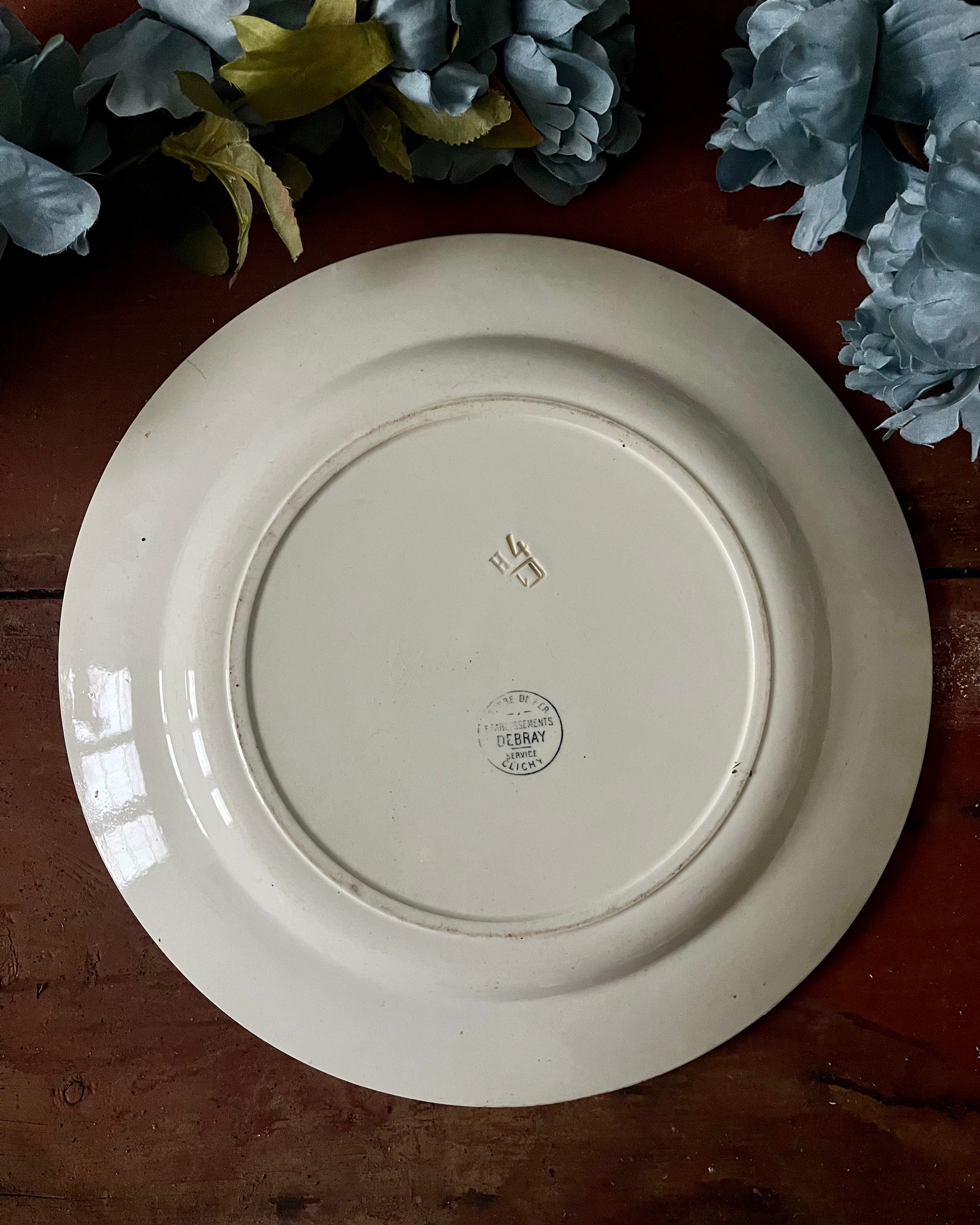 Grand plat rond terre de fer Debray