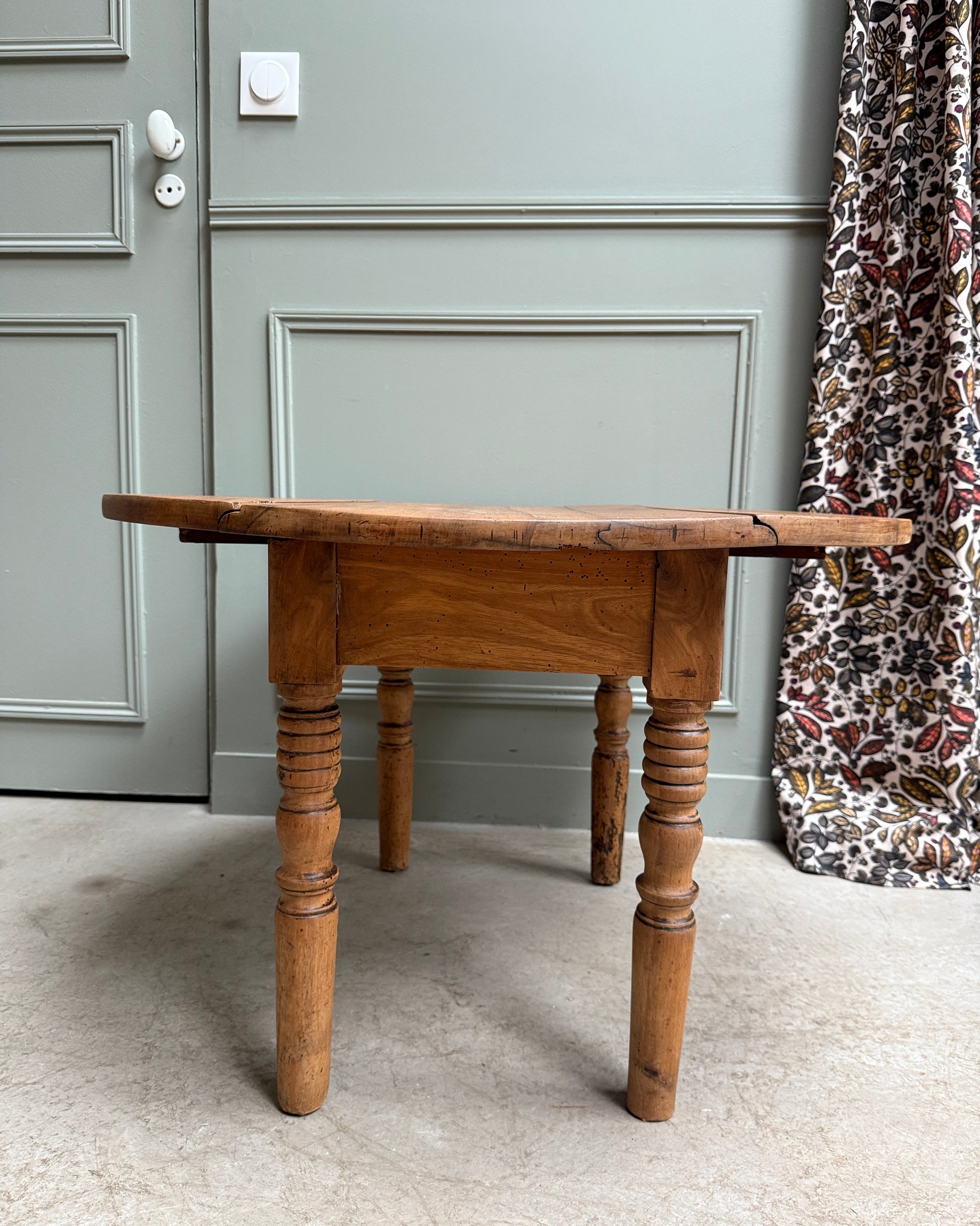 Table basse ronde à volets