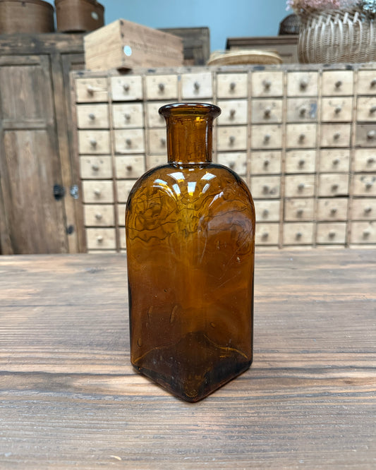 Flacon vintage en verre ambré